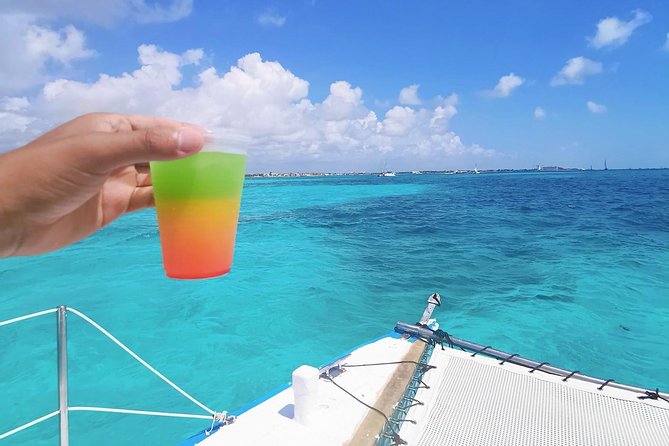 Isla Mujeres Premium Catamaran Tour with transportation from Playa del Carmen - Reaching Isla Mujeres and finding your time