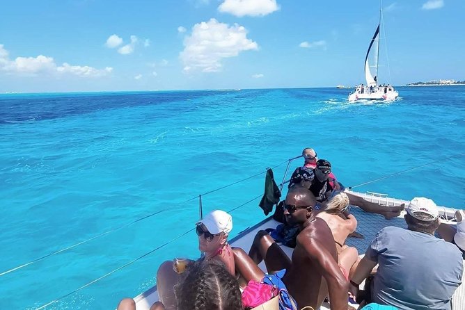 Isla Mujeres Premium Catamaran Tour with transportation from Playa del Carmen - The return sail and late ride back