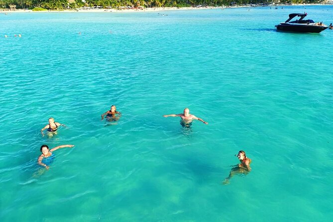 Isla Mujeres Premium Tour in Private Catamaran with Lunch - Lunch and drinks at Club Playa Mexico