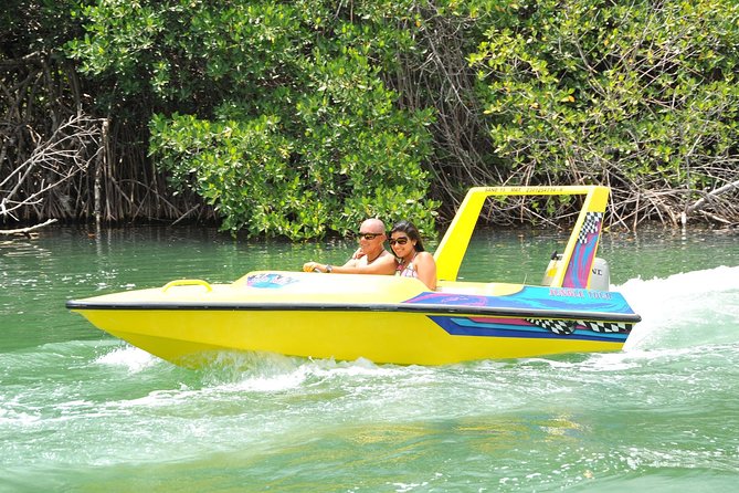 Jungle Tour with Snorkel in Cancun - Snorkeling by coral and underwater statues