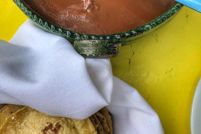Mama's Kitchen - Sitting down to chicken, rice, and mezcal margaritas