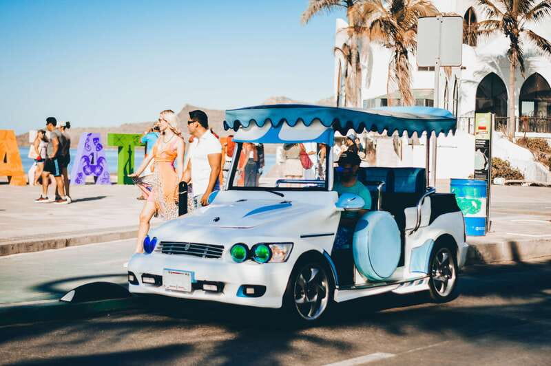 Mazatlan: City Tour in a Traditional "Pulmonia" Open-Air Car - Why the pulmonia makes sense in Mazatlan