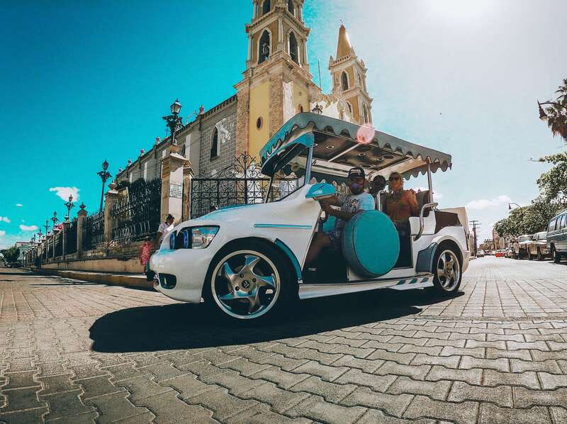 Mazatlan: City Tour in a Traditional "Pulmonia" Open-Air Car - Playa Norte and the flying birds