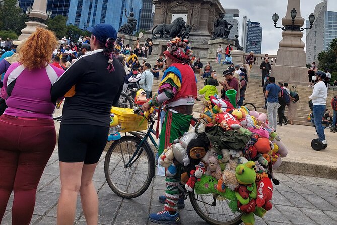 Mexico City E-Bike Tour with a taco and churros stop - The Voladores and Mexico City’s central traditions