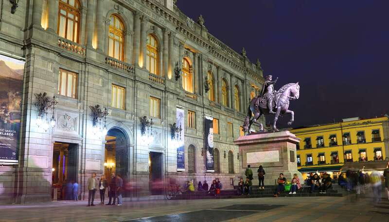 Mexico City: Night City Tour in a Double Decker Bus - Angel of Independence is the photographic high point