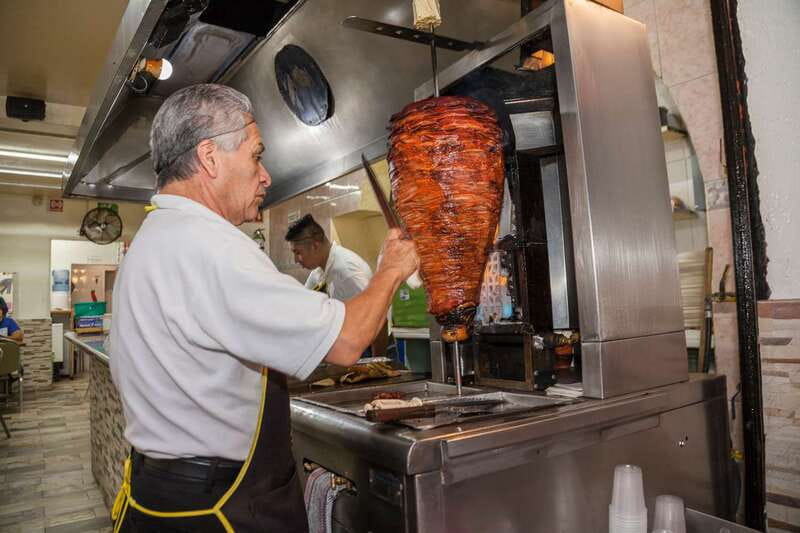 Mexico City: Tacos & Mezcal Night Food Tour - A contemporary taquería changes the rhythm
