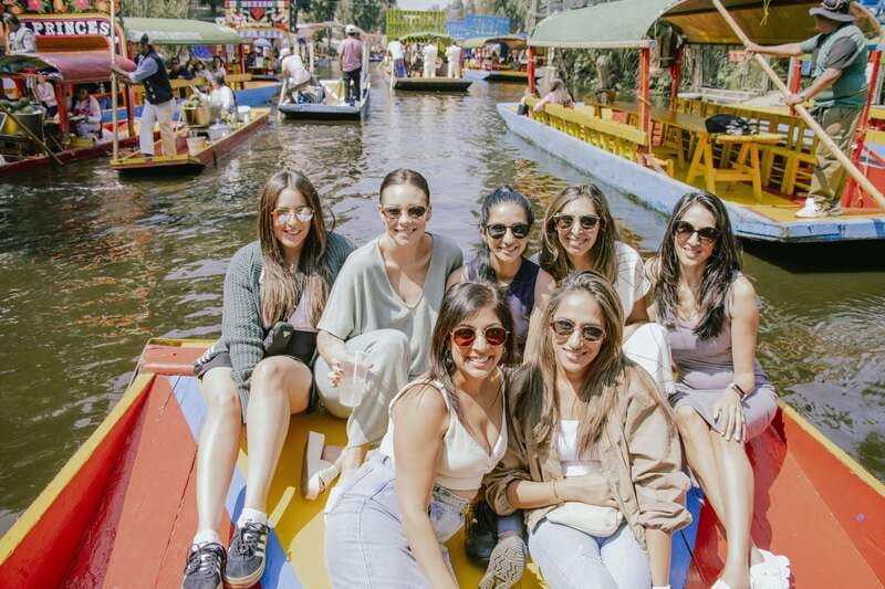 Mexico City: Xochimilco Boat with Guacamole & Premium Drinks - Making guacamole instead of simply eating it