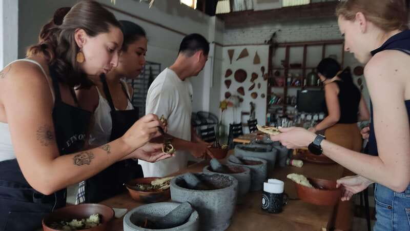 Oaxaca: Oaxacan Mole Workshop with a Traditional Cook - Eating together with mezcal and seasonal fruit water