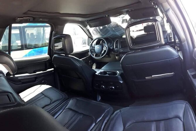 One-way Airport Transfer to Cancun or Playa del Carmen - Wi-Fi, music, water, and drinks