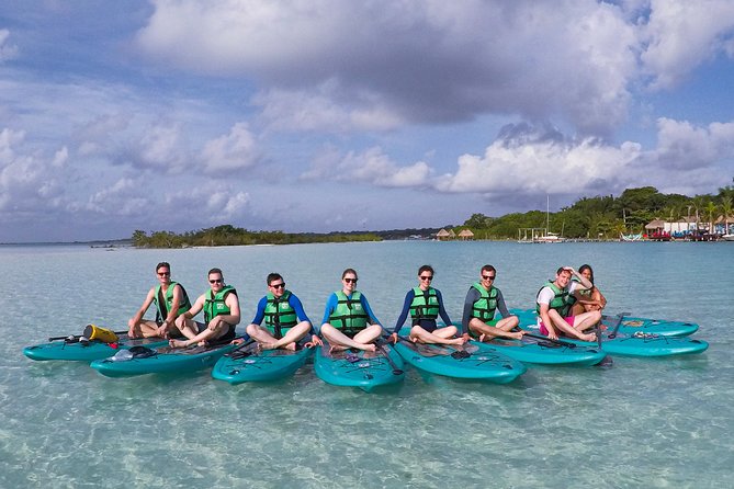 Paddleboarding and/or kayaking tour at sunrise in the lagoon of Bacalar - The first hour: stars, darkness, and open water