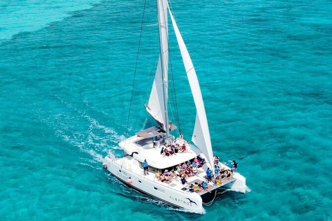 Plus Full Day Catamaran Tour to Isla Mujeres All Inclusive - Punta Sur and the beach club stop