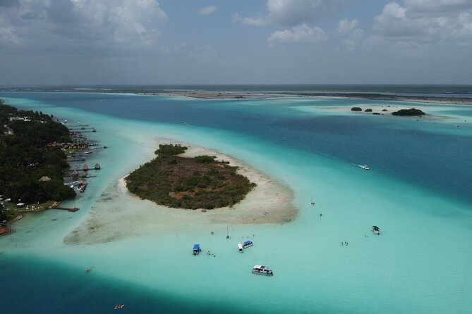 Pontoon Tour - Visit the Pirate Channel, Cenotes and Islands. - Fruit, Water, and One Cold Beer