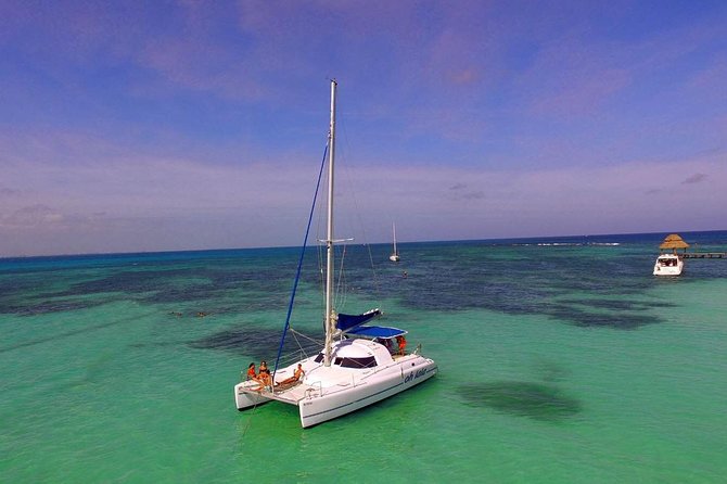Private Catamaran from Cancun to Isla Mujeres | For up to 25 ppl - Price and Group Value at $1,185