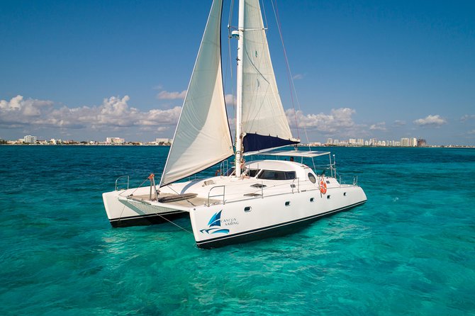 Private Catamaran from Cancun to Isla Mujeres | For up to 40 pp - Sailing, spinnaker flights, and the open bar