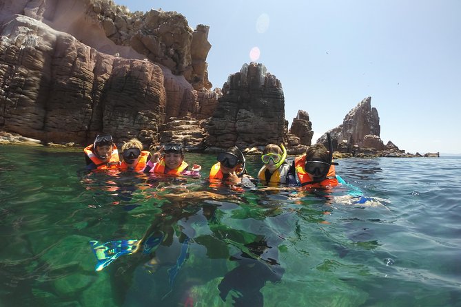 Private Snorkeling Tour in Cabo San Lucas - Equipment, snacks, and comfort on the boat