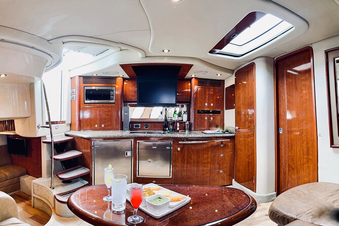 Private Yacht Sea Ray all-inclusive charter in Cabo - Médano Beach with snacks and an open bar
