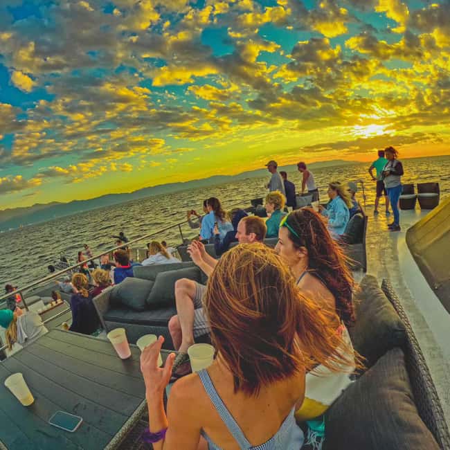 Puerto Vallarta: Mega Yacht Whale Watching Sunset Cruise - Searching for humpback whales in winter
