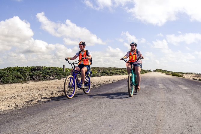 Punta Sur Eco Beach Park Electric Bike Tour in Cozumel - Riding an electric bike through Punta Sur