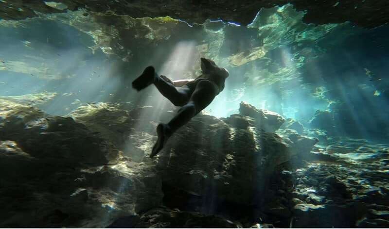 Riviera Maya: Tulum Ruins and 2 Cenotes Half-Day Tour - Walking through Tulum’s sea-facing ruins