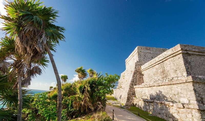 Riviera Maya: Tulum Ruins and 2 Cenotes Half-Day Tour - Reaching Tulum by air-conditioned coach