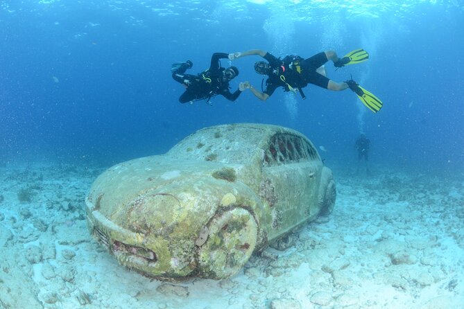 Scuba Diving Under Water Museum and Reef for beginners - The Pool Session Builds Basic Confidence