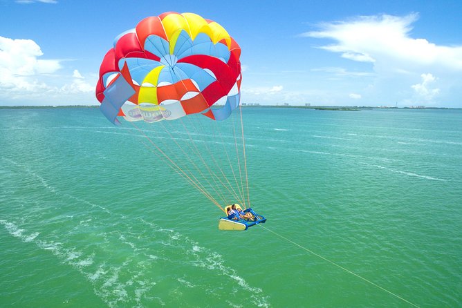 Skyrider Parasailing Tour with Panoramic View of Cancun - Taking off on the Skyrider bench
