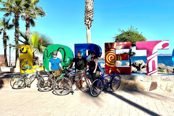 Small Group Food and Bike or Walking Tour in Loreto - Stop one: Malecon views and the Loreto sign