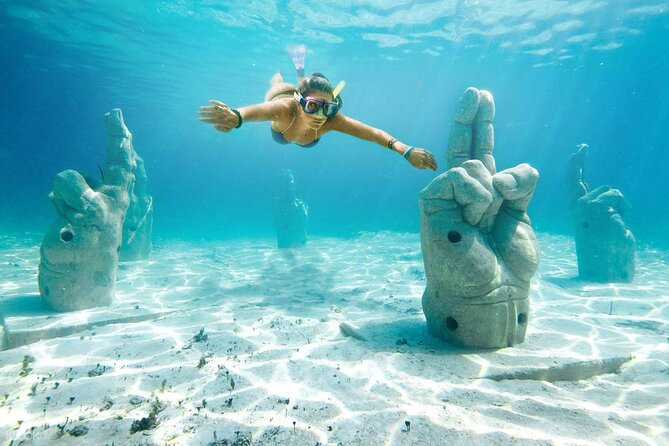 Snorkeling in Isla Mujeres and Underwater Museum - The beach-club stop and Tikinxic fish lunch