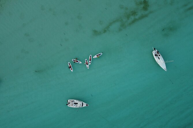 Sunrise on Paddleboard with breakfast in the lagoon of 7 colors - The Black Cenote and Bacalar’s changing water
