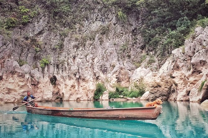 Tamul waterfall and water cave on a wooden canoe - Local lunch in La Morena community