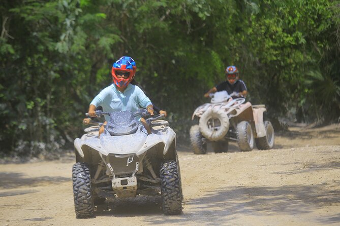 Top ATV's in Mexico includes Cenote, Ziplines, snack & transport. - The ATV ride through muddy jungle roads