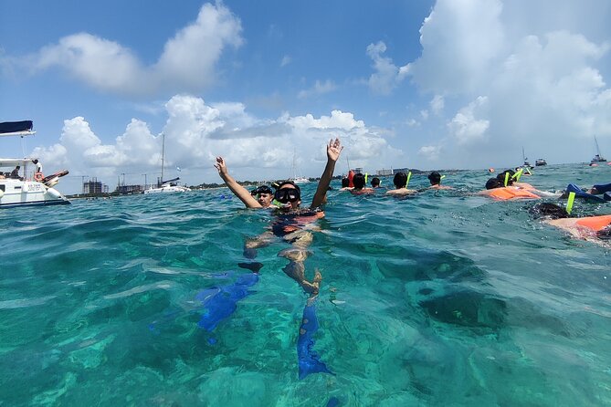 Top Isla Mujeres Catamaran Tour with Snorkel Open Bar and Buffet lunch - What this Isla Mujeres day is really selling