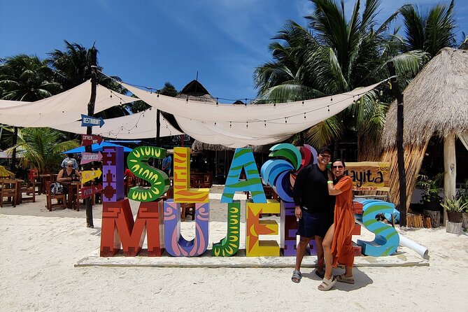 Top Isla Mujeres Catamaran Tour with Snorkel Open Bar and Buffet lunch - The guides make or break the mood