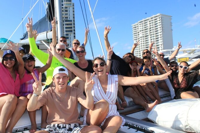 Top Isla Mujeres Catamaran Tour with Snorkel Open Bar and Buffet lunch - Setting sail with drinks and music