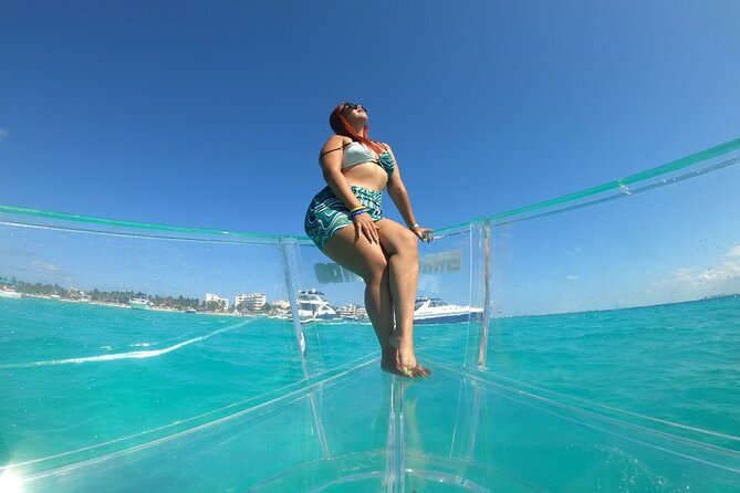Tour Isla Mujeres excursion in Collective Transparent Boat - El Farito reef and the best chance for marine life