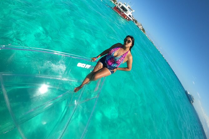 Tour Isla Mujeres excursion in Collective Transparent Boat - La Carbonera canal and the return to the marina