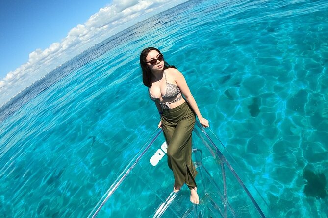 Tour Isla Mujeres excursion in Collective Transparent Boat - Marine life is a bonus, not a guarantee