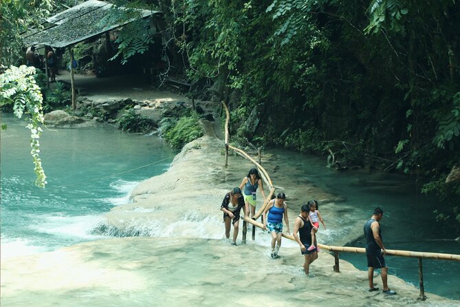 Tour to Copalitilla Magical Waterfalls from Huatulco with admission included - Swimming, caves, ropes, and slippery rock