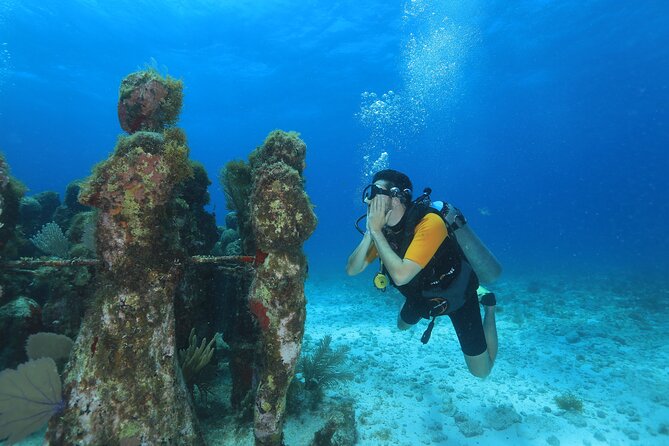 Two Tanks Scuba Diving for Beginners in Cancun - Getting fitted with the scuba equipment