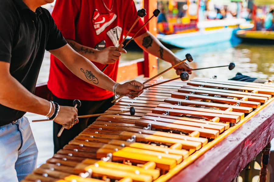 Xochimilco: traditional boat tour, culture, and fun. - Games, slang, music, and the social side